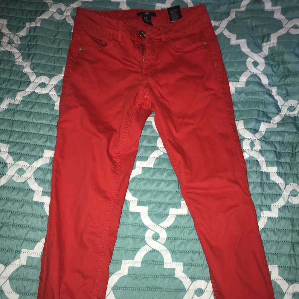 Woman’s red jeans